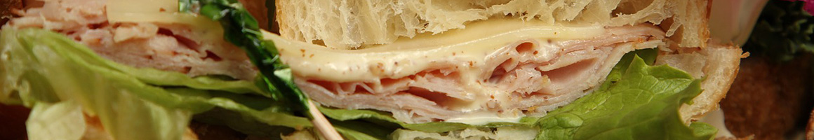 Eating American (Traditional) Mongolian Sandwich Southern at McCutchen's Magnolia House restaurant in Scottsboro, AL.